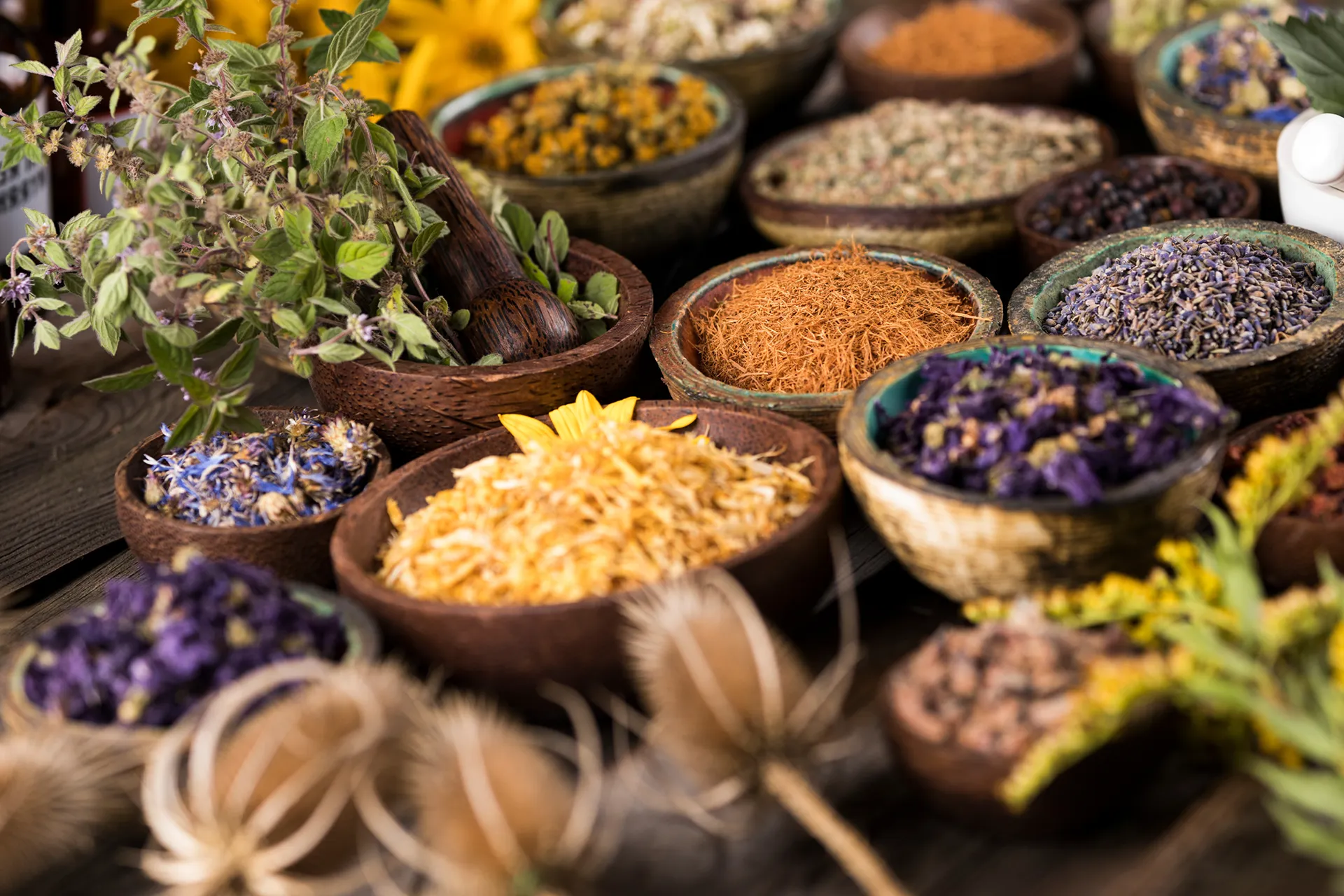 Organized packages beside aromatic herbs and natural incense